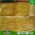 Red color pp tubular mesh bags for 50kg vegetables 65x90cm